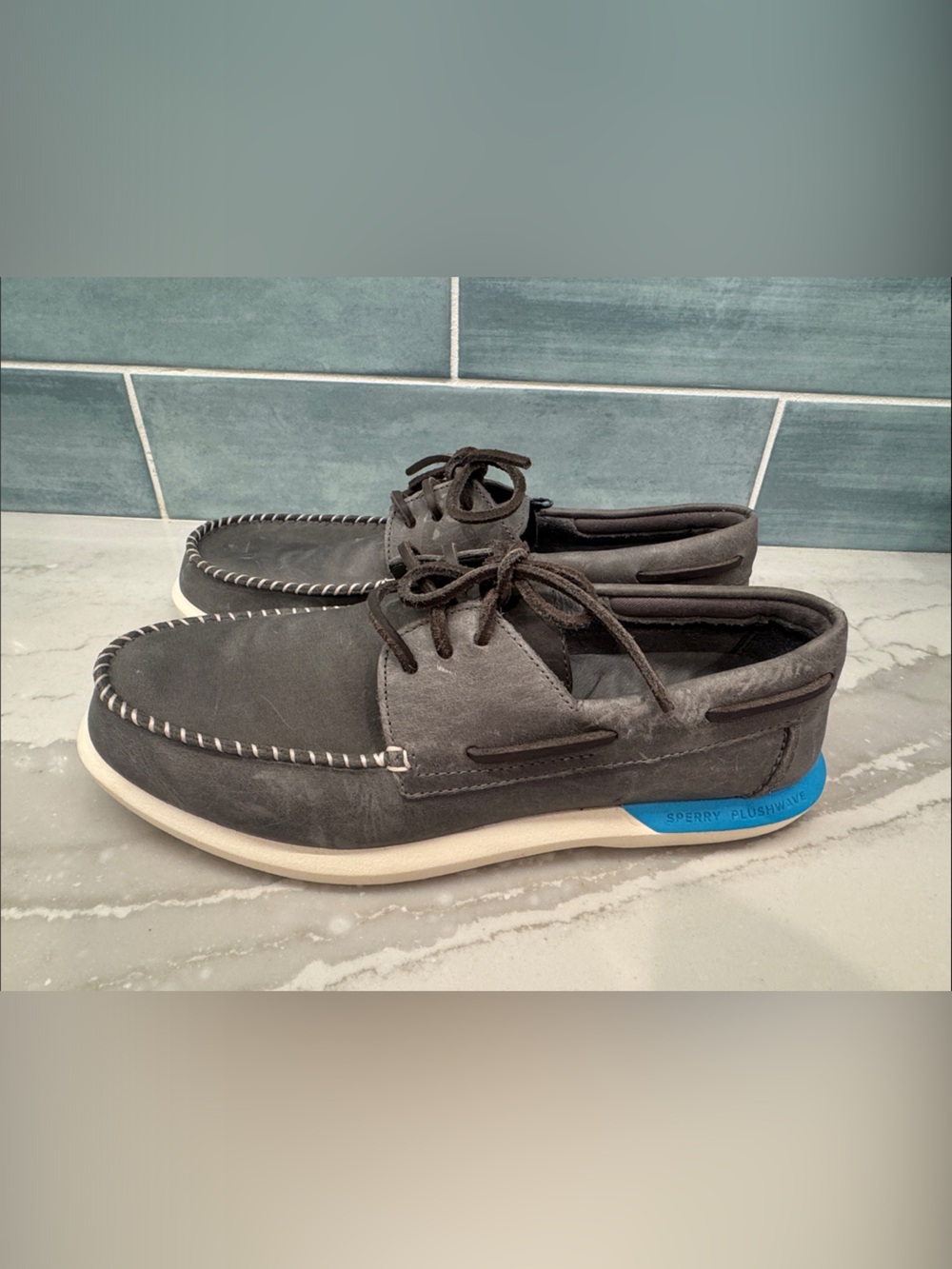 Sperry Men's Gray Suede Boat Shoes with White Sole and Blue Heel Accent